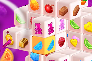 Image de cubes colorés avec des bonbons, des fruits, et des oursons en gélatine pour un jeu de type puzzle ou match-3