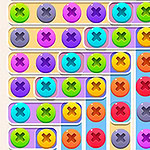 Jeu de puzzle coloré avec des boutons ronds à motifs de croix en différentes couleurs