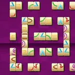 Jeu de mahjong avec des tuiles colorées sur fond violet